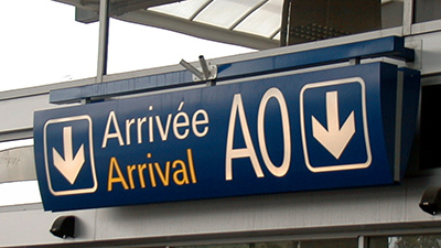 Image of airport arrival sign